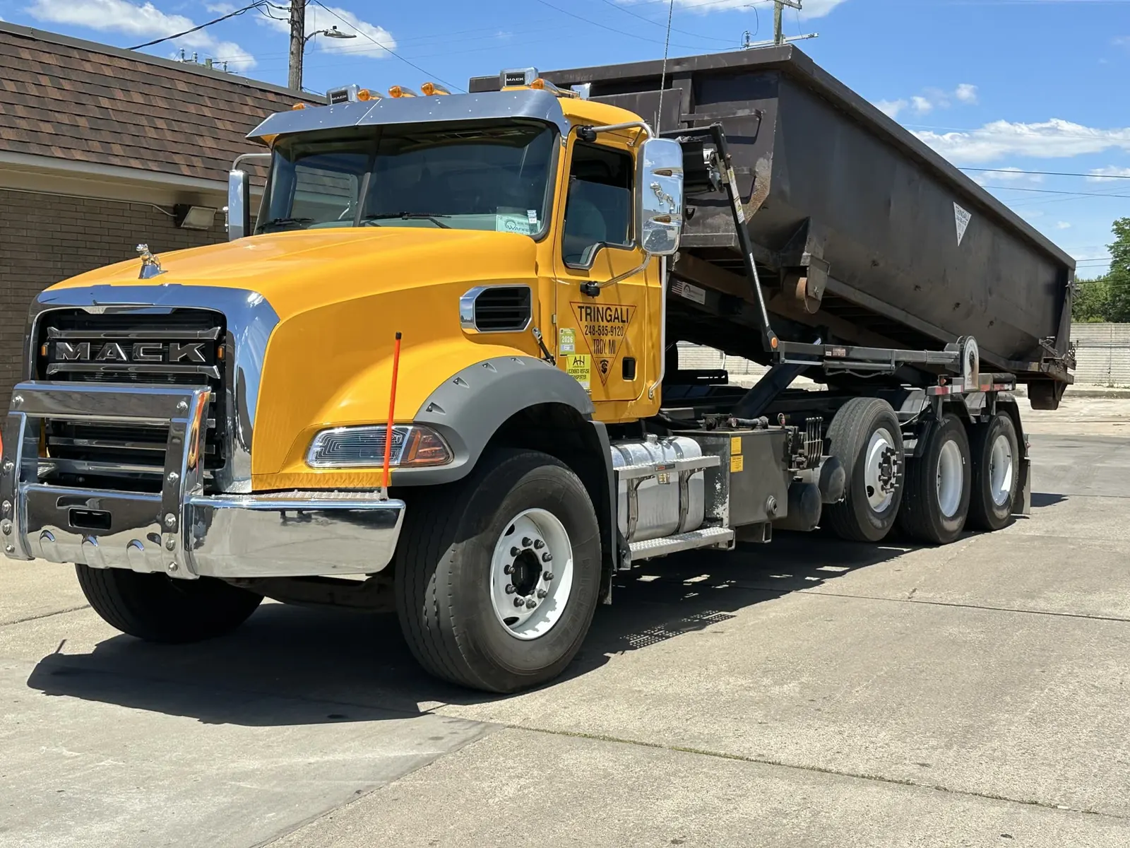 Tringali Sanitation roll-off dumpster truck